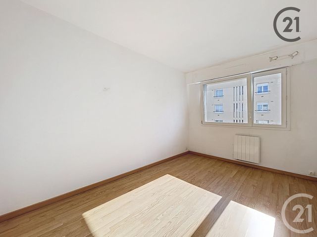 Afficher la photo en grand Appartement T4 à vendre - 4 pièces - 76,70 m2 - Troyes - 10 - CHAMPAGNE-ARDENNE
