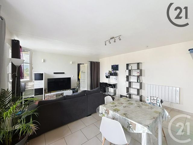 Afficher la photo en grand Appartement T4 à vendre - 4 pièces - 62,40 m2 - Troyes - 10 - CHAMPAGNE-ARDENNE