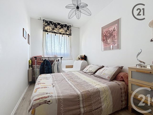 Afficher la photo en grand Appartement T4 à vendre - 4 pièces - 59,85 m2 - Troyes - 10 - CHAMPAGNE-ARDENNE