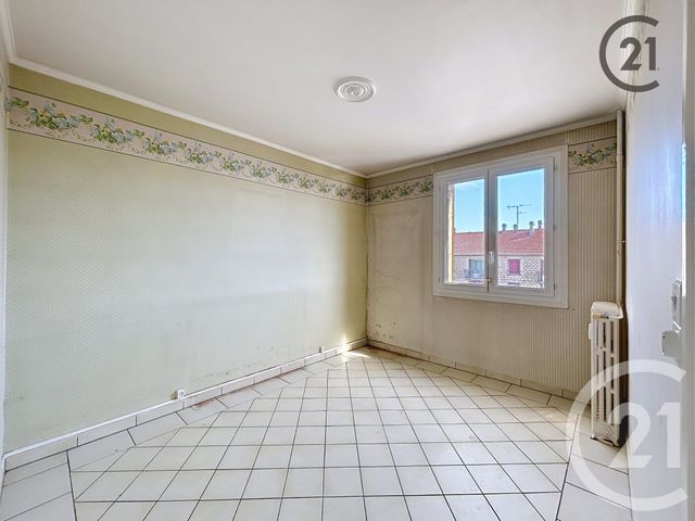 Afficher la photo en grand Appartement F4 à vendre - 4 pièces - 58,73 m2 - La Chapelle St Luc - 10 - CHAMPAGNE-ARDENNE