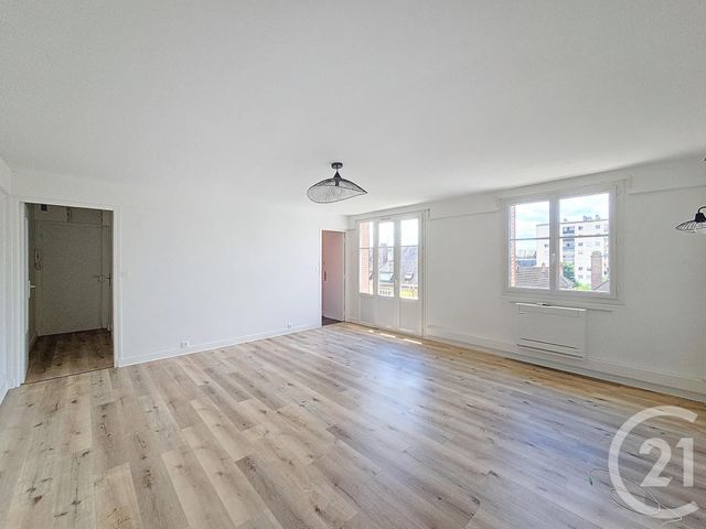 Afficher la photo en grand Appartement F4 à louer - 4 pièces - 65,37 m2 - Troyes - 10 - CHAMPAGNE-ARDENNE